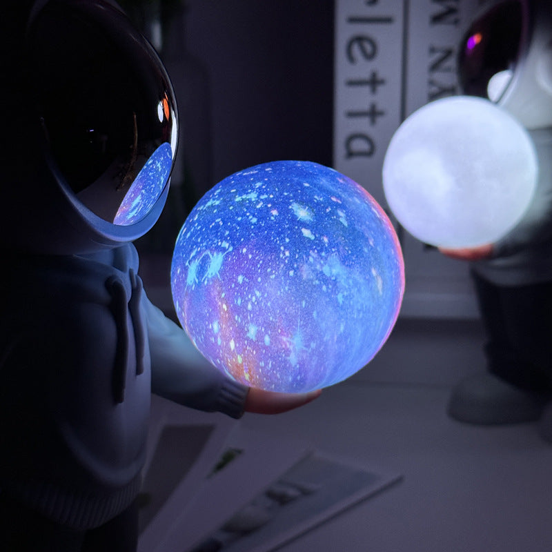 NNEDSZ Holding the romantic moon (black top + red pants) Creative Astronaut Bluetooth Speaker with 3D Starry Sky Lighting, Portable Wireless Moon Lamp Speaker - Perfect Gift for Space Enthusiasts