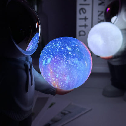NNEDSZ Holding the romantic moon (black top + red pants) Creative Astronaut Bluetooth Speaker with 3D Starry Sky Lighting, Portable Wireless Moon Lamp Speaker - Perfect Gift for Space Enthusiasts