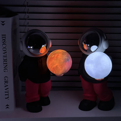 NNEDSZ Holding the romantic moon (black top + red pants) Creative Astronaut Bluetooth Speaker with 3D Starry Sky Lighting, Portable Wireless Moon Lamp Speaker - Perfect Gift for Space Enthusiasts